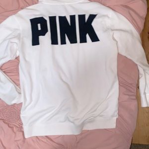 Pink Cree sweatshirt.
